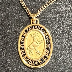 10.  Taurus Gold Tone Pendant On 18” Chain Necklace